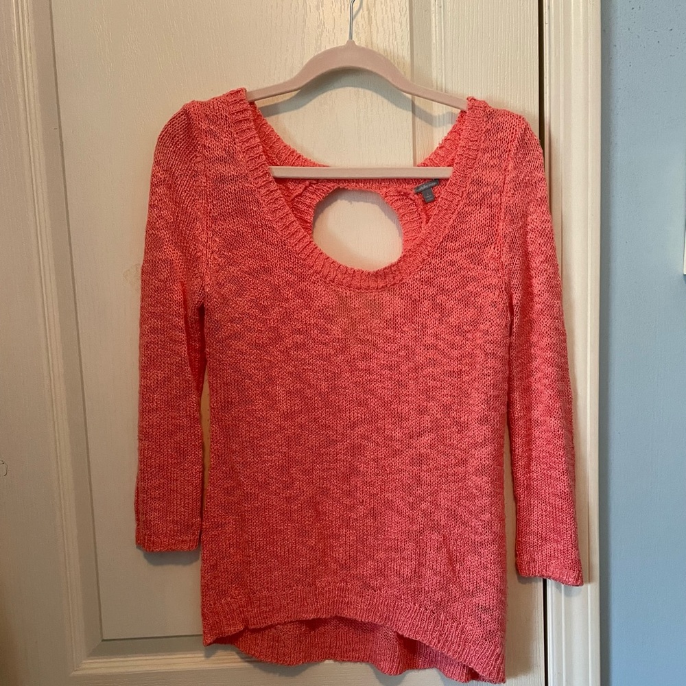 Coral sweater with open back